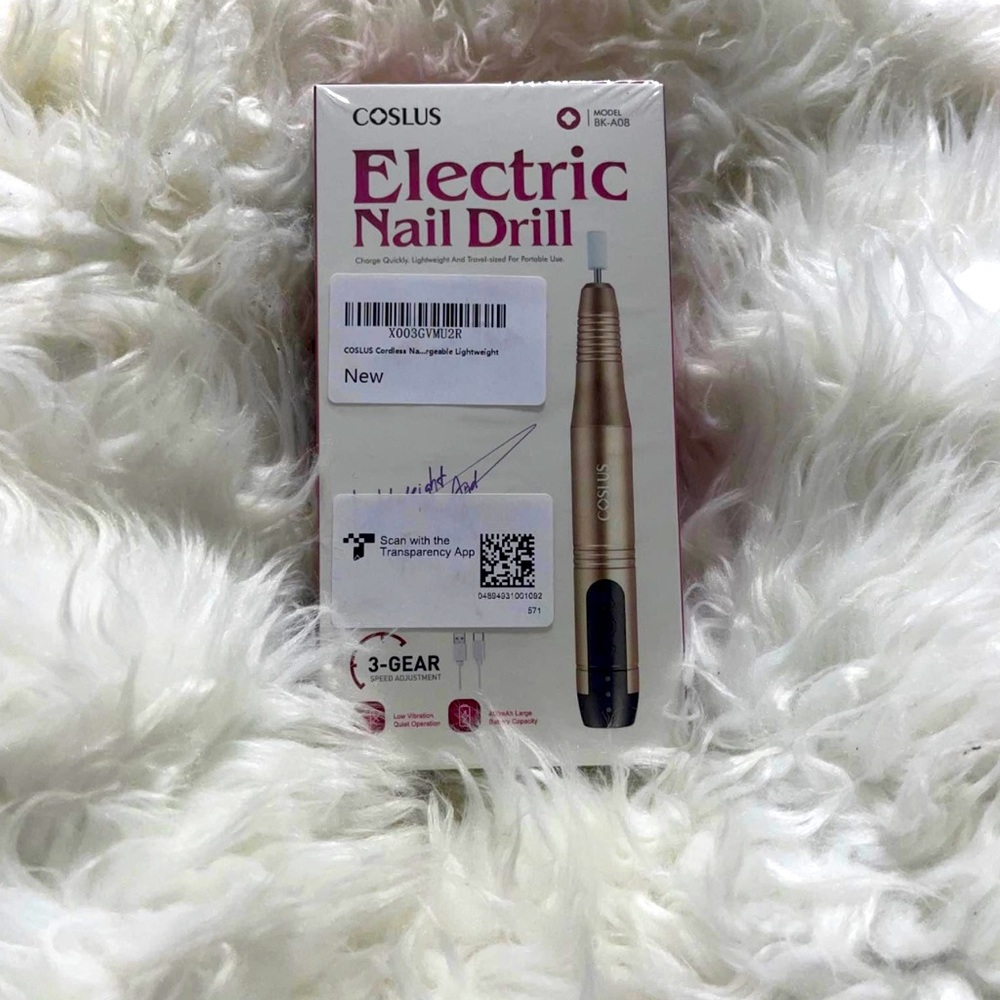 Electric nail drill includes cuticle oil